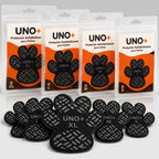 Protectores antideslizantes UNO+ para patitas en talles XL, L, M y S, con sus paquetes y la textura de agarre a la vista
